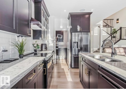 5209 22A Avenue, Edmonton, AB - Indoor Photo Showing Kitchen With Double Sink With Upgraded Kitchen