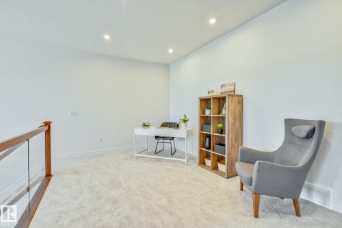 Home office with light colored carpet and recessed lighting - 8320 Mayday Link Sw, Edmonton, AB - Indoor Photo Showing Other Room