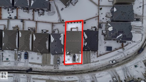 Aerial view of residential area with property boundaries highlighted - 8320 Mayday Link Sw, Edmonton, AB - 