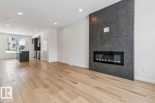 8120 228 Street, Edmonton, AB - Indoor Photo Showing Living Room With Fireplace