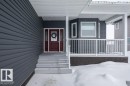 Doorway to property featuring a porch - 11116 103 Street, Westlock, AB  - Outdoor With Deck Patio Veranda 