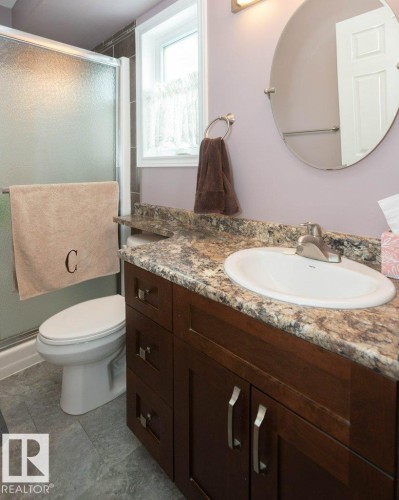 Full bathroom featuring vanity and a shower stall - 11116 103 Street, Westlock, AB - Indoor Photo Showing Bathroom