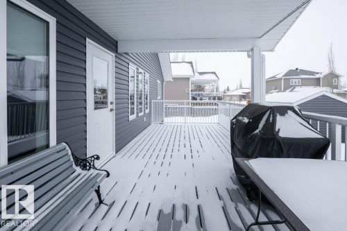 View of wooden terrace - 11116 103 Street, Westlock, AB - Outdoor With Deck Patio Veranda With Exterior