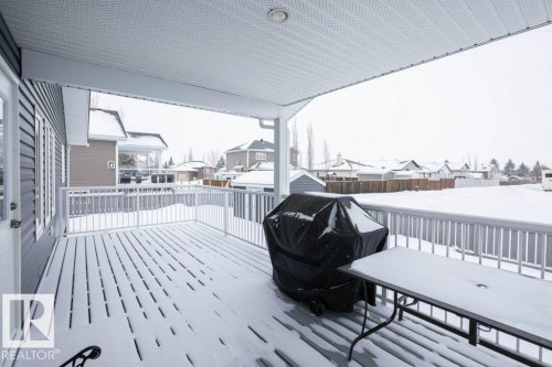 Deck with a residential view and grilling area - 11116 103 Street, Westlock, AB - Outdoor With Deck Patio Veranda With Exterior