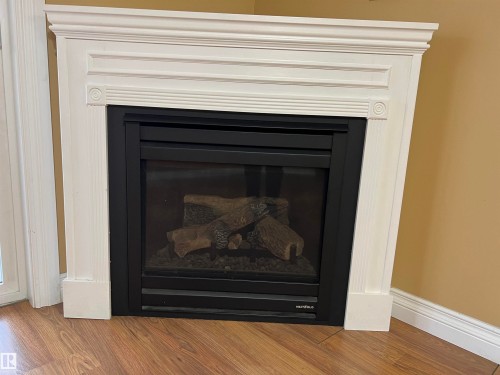 #306 4128 47 Street, Drayton Valley, AB - Indoor Photo Showing Living Room With Fireplace