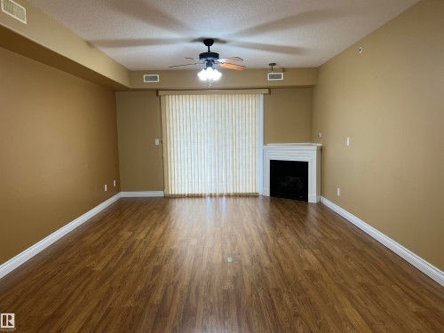#306 4128 47 Street, Drayton Valley, AB - Indoor With Fireplace