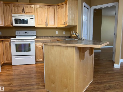 #306 4128 47 Street, Drayton Valley, AB - Indoor Photo Showing Kitchen With Double Sink