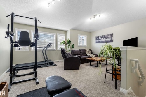 7422 Singer Landing Landing, Edmonton, AB - Indoor Photo Showing Gym Room