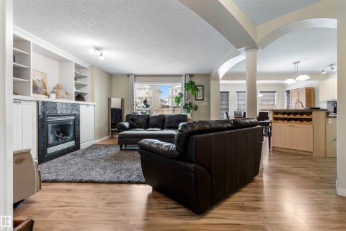 7422 Singer Landing Landing, Edmonton, AB - Indoor Photo Showing Living Room With Fireplace