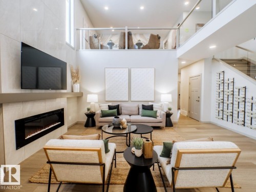 7005 Kiviaq Crescent, Edmonton, AB - Indoor Photo Showing Living Room With Fireplace