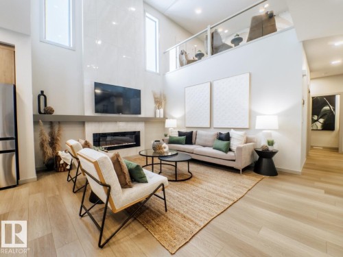 7005 Kiviaq Crescent, Edmonton, AB - Indoor Photo Showing Living Room With Fireplace