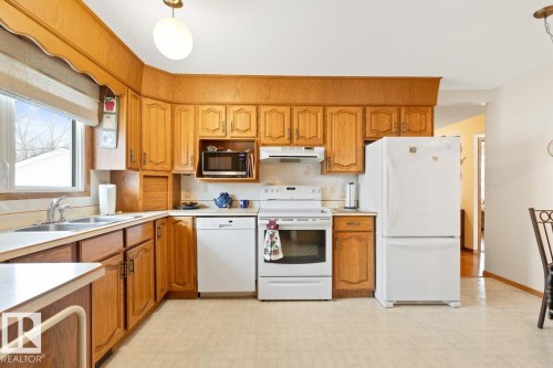 60 Peace River Drive, Devon, AB - Indoor Photo Showing Kitchen With Double Sink