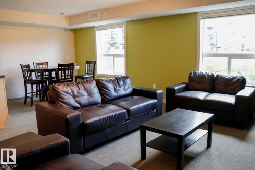 111 392 Silver Berry Road, Edmonton, AB - Indoor Photo Showing Living Room