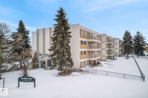 Snow covered property featuring a view of apartment building / complex - 302 4608 52 Avenue, Stony Plain, AB - Outdoor With Facade