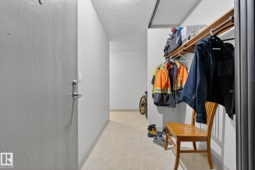 Walk in closet featuring light tile patterned floors - 302 4608 52 Avenue, Stony Plain, AB - Indoor
