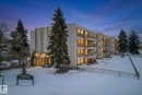 Snow covered building with a view of apartment building / complex - 307 4608 52 Avenue, Stony Plain, AB  - Outdoor With Balcony 