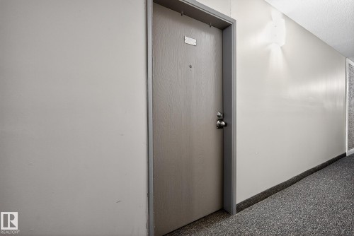 View of exterior entry - 307 4608 52 Avenue, Stony Plain, AB - Indoor Photo Showing Other Room