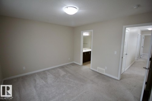 Upper 2436 Casey Link Sw, Edmonton, AB - Indoor Photo Showing Other Room