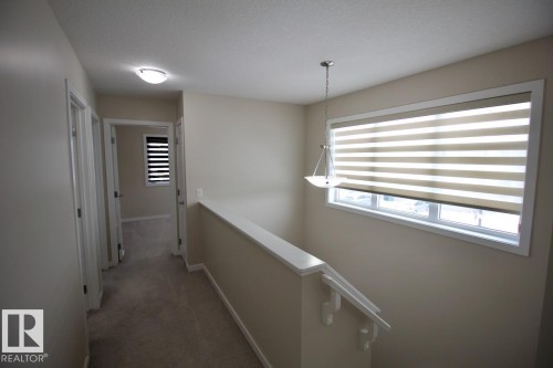 Upper 2436 Casey Link Sw, Edmonton, AB - Indoor Photo Showing Other Room