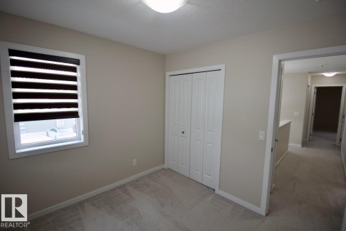 Upper 2436 Casey Link Sw, Edmonton, AB - Indoor Photo Showing Other Room