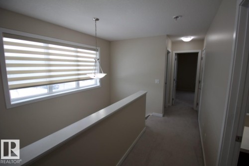 Upper 2436 Casey Link Sw, Edmonton, AB - Indoor Photo Showing Other Room