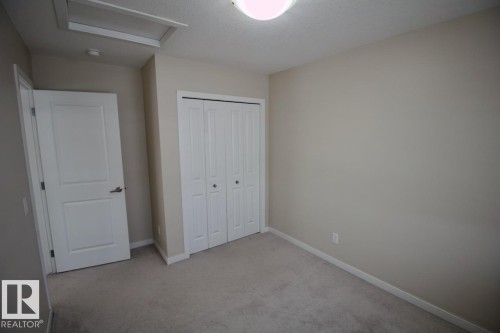 Upper 2436 Casey Link Sw, Edmonton, AB - Indoor Photo Showing Other Room