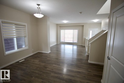 Upper 2436 Casey Link Sw, Edmonton, AB - Indoor Photo Showing Other Room