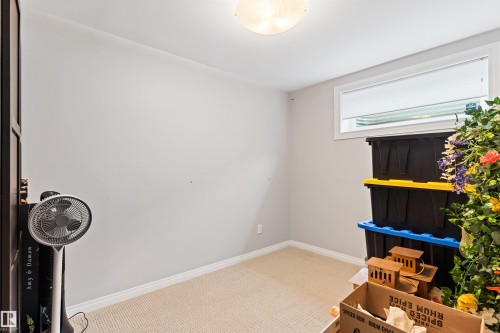 Interior space with light colored carpet and baseboards - 7804 Schmid Place, Edmonton, AB - Indoor Photo Showing Other Room