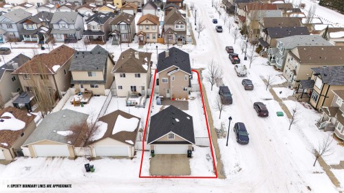 Snowy aerial view featuring property parcel outlined and a residential view - 7804 Schmid Place, Edmonton, AB - Outdoor