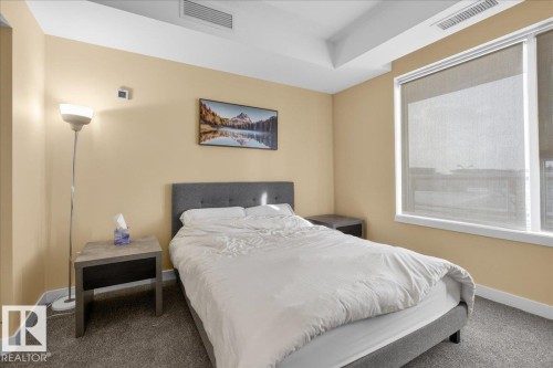 Carpeted bedroom with baseboards - 301 2504 109 Street, Edmonton, AB - Indoor Photo Showing Bedroom
