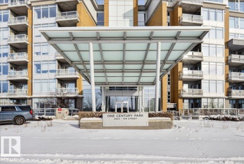 Snow covered property with a view of apartment building / complex - 301 2504 109 Street, Edmonton, AB - Outdoor With Balcony With Facade