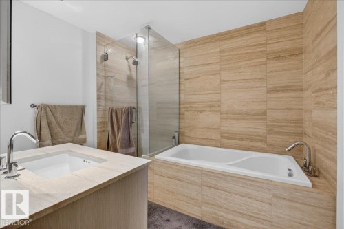 Full bathroom with vanity, a garden tub, and a shower stall - 301 2504 109 Street, Edmonton, AB - Indoor Photo Showing Bathroom