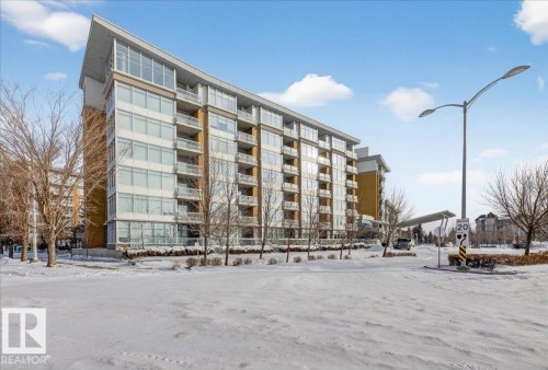 Snow covered property featuring a view of apartment building / complex - 301 2504 109 Street, Edmonton, AB - Outdoor With Balcony With Facade