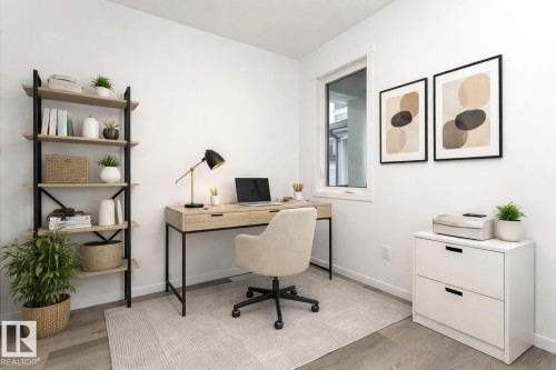 Office space featuring light wood-style flooring and baseboards - 3790 Wren Loop, Edmonton, AB - Indoor Photo Showing Office