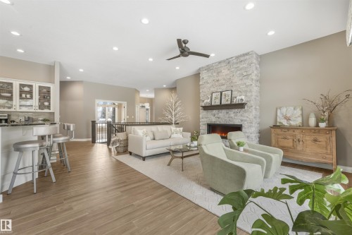 1130 Twin Brooks Point(E), Edmonton, AB - Indoor Photo Showing Living Room With Fireplace