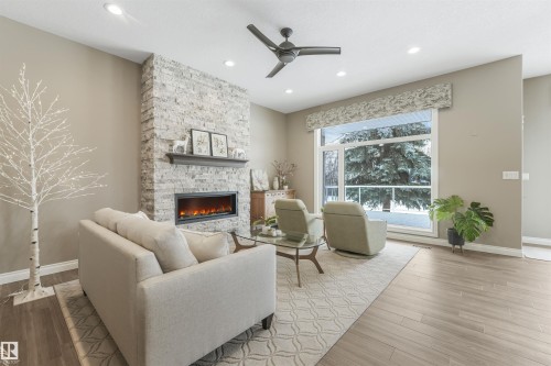 1130 Twin Brooks Point(E), Edmonton, AB - Indoor Photo Showing Living Room With Fireplace