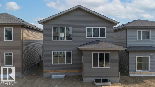 Back of property - 3912 41 Avenue, Beaumont, AB - Outdoor With Exterior