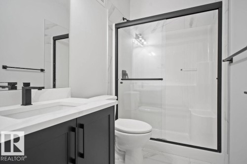 Full bathroom featuring vanity and a shower stall - 3912 41 Avenue, Beaumont, AB - Indoor Photo Showing Bathroom