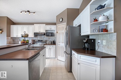 1825 Tufford Way, Edmonton, AB - Indoor Photo Showing Kitchen With Double Sink