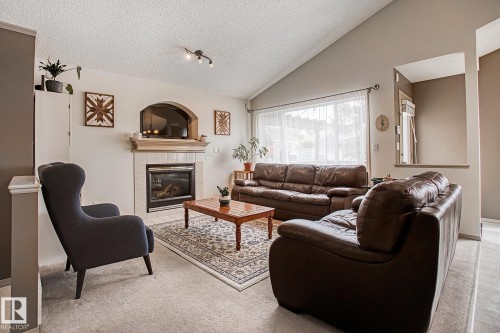 1825 Tufford Way, Edmonton, AB - Indoor Photo Showing Living Room With Fireplace