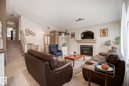 1825 Tufford Way, Edmonton, AB - Indoor Photo Showing Living Room With Fireplace