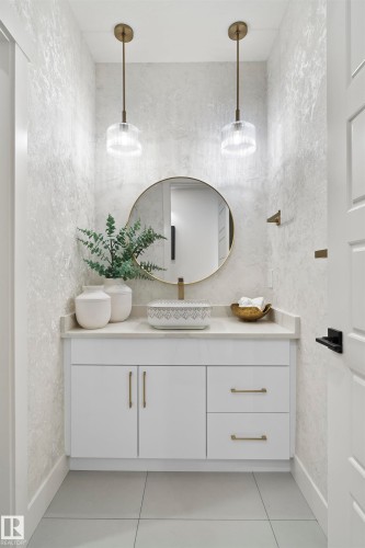 Bathroom with vanity and light tile patterned floors - 13152 187 Avenue, Edmonton, AB - Indoor Photo Showing Bathroom