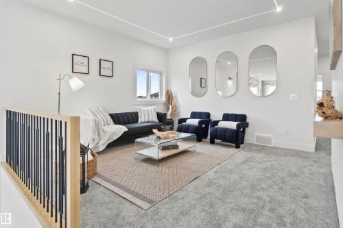 Carpeted living room with recessed lighting - 13152 187 Avenue, Edmonton, AB - Indoor
