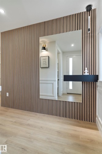 Spare room featuring recessed lighting, light wood-type flooring, and wallpapered walls - 13152 187 Avenue, Edmonton, AB - Indoor Photo Showing Other Room