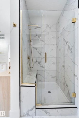 Bathroom with a marble finish shower - 13152 187 Avenue, Edmonton, AB -  Photo Showing Bathroom