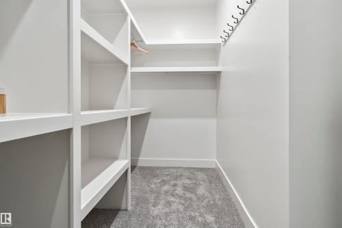 Walk in closet with light colored carpet - 13152 187 Avenue, Edmonton, AB - Indoor With Storage