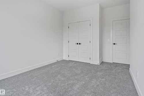 Unfurnished bedroom featuring carpet and a closet - 13152 187 Avenue, Edmonton, AB - Indoor Photo Showing Other Room