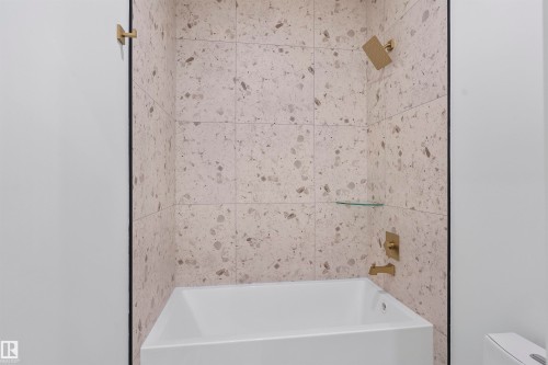 Bathroom with toilet and shower / bath combination - 13152 187 Avenue, Edmonton, AB - Indoor