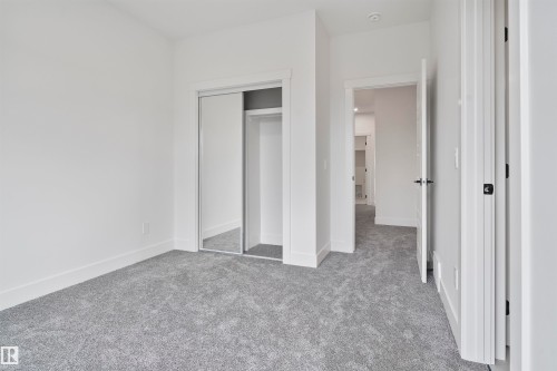Unfurnished bedroom featuring carpet floors and a closet - 13152 187 Avenue, Edmonton, AB - Indoor Photo Showing Other Room
