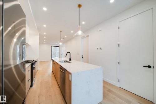 7540 80 Avenue, Edmonton, AB - Indoor Photo Showing Kitchen With Double Sink With Upgraded Kitchen